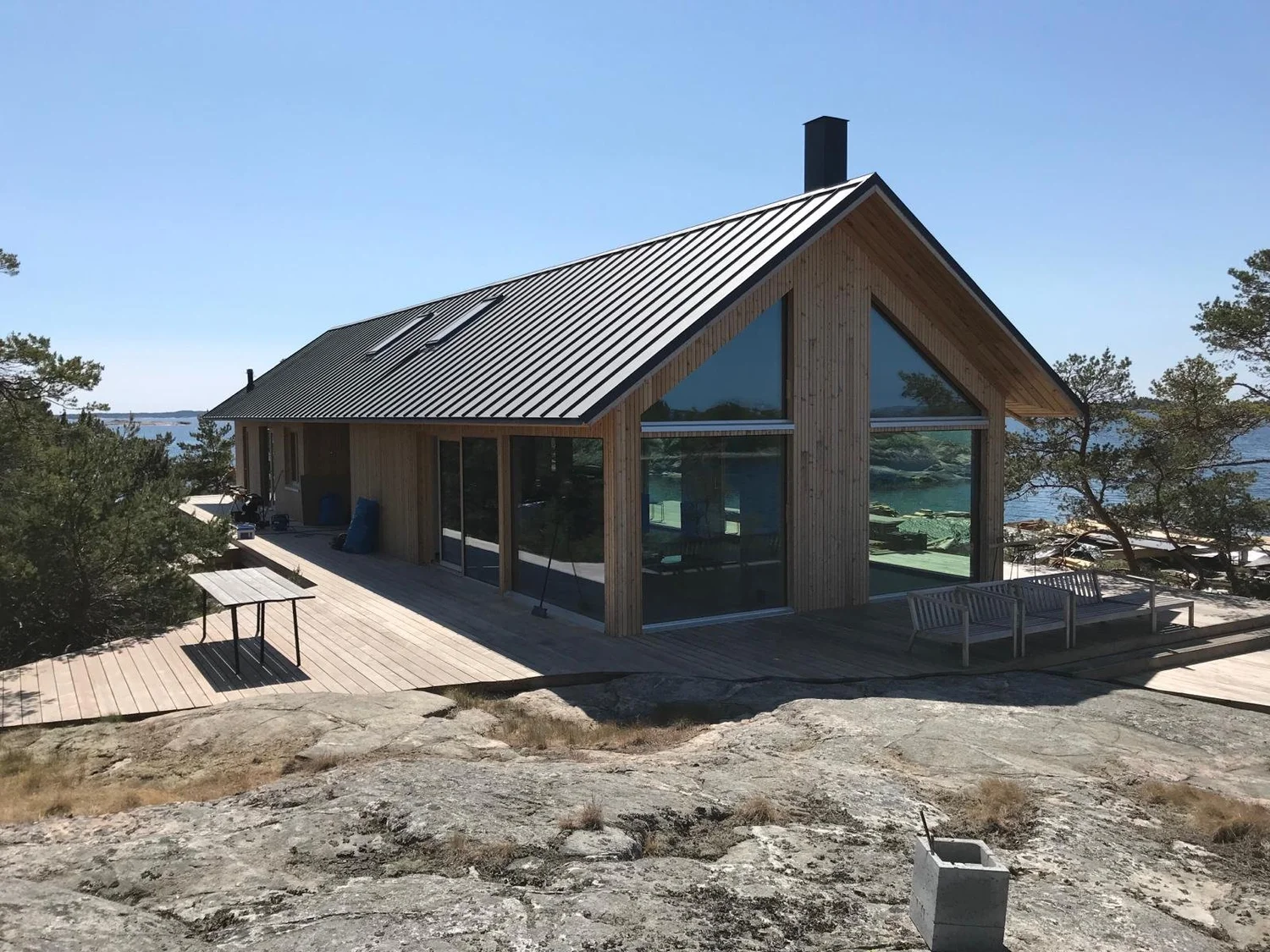 Hirsitalo saaristossa — Rakennusliike Marko Järviö